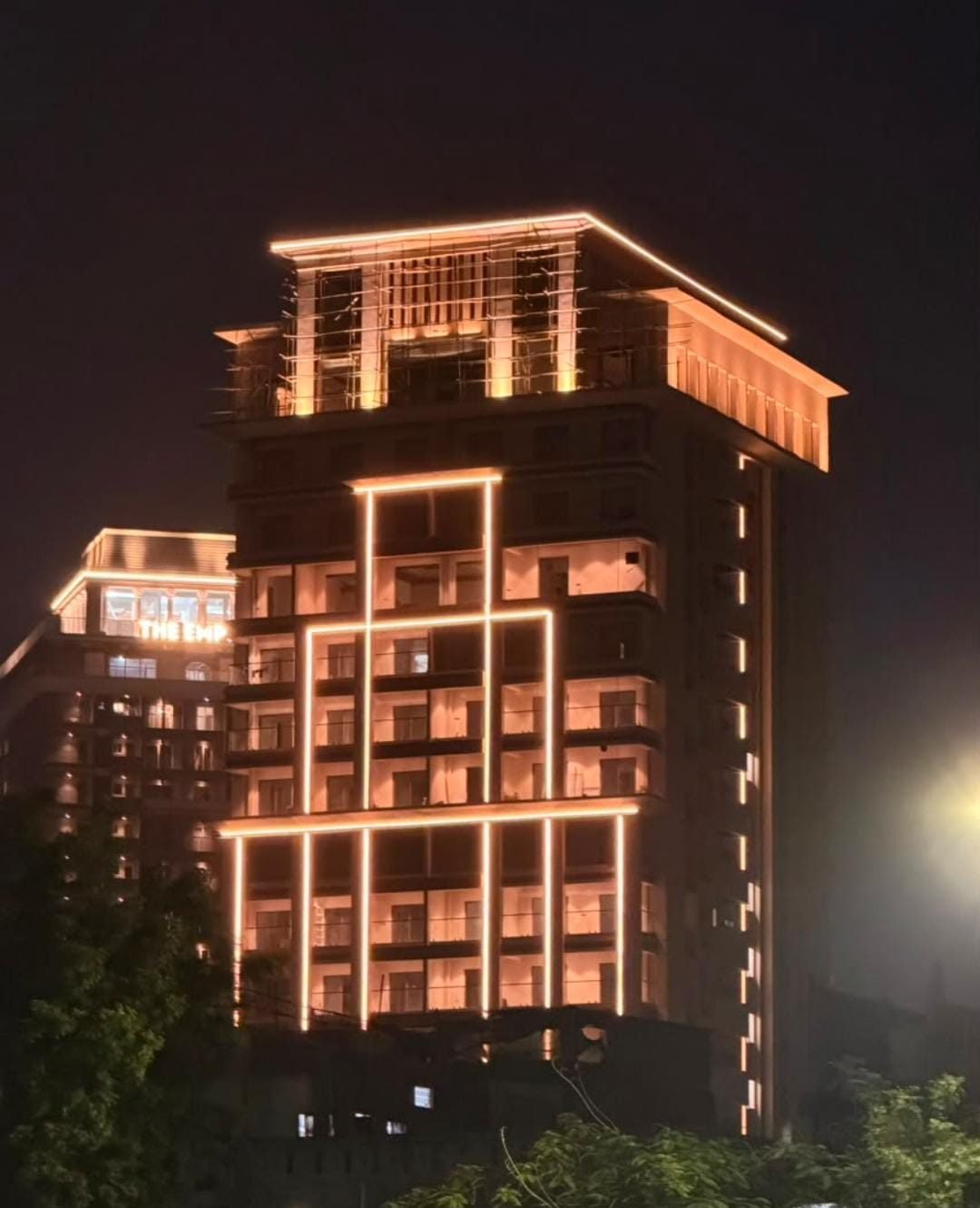 Residential tower with architectural line lighting